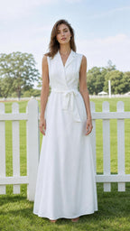 Front view of model wearing white sleeveless lapel maxi dress