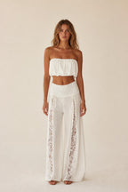 Front view of the white boho lace panel tube top and wide leg pants set