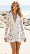 Front view of woman wearing white floral lace beach cover-up dress