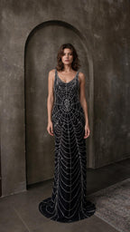 Front view of black beaded evening maxi dress