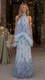 Front view of model wearing light blue floral ruffled halter maxi dress