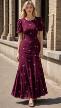 Front view of burgundy floral embroidered maxi dress