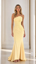 Front view of yellow strapless beaded mermaid evening dress