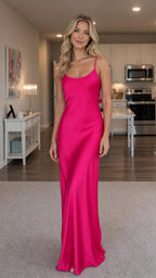 Front view of model wearing hot pink satin maxi slip dress