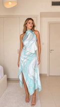 Front view of light blue swirl print halter midi dress
