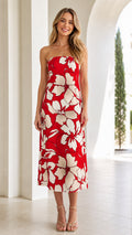 Front view of woman wearing red and white floral strapless midi dress