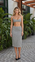 Model wearing black houndstooth two piece set front view