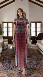 Front view of model wearing multi-stripe maxi dress