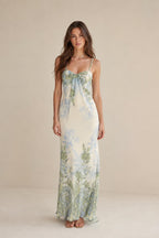 Front view of model wearing ivory floral maxi dress