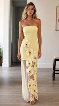 Front view of yellow strapless 3d floral maxi dress