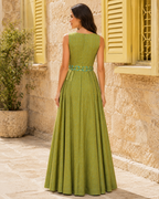 Back view of olive green sleeveless shimmer maxi dress with contrast waist sash