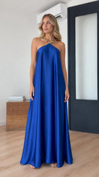 Front view of model wearing royal blue halter maxi dress