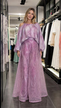 Model wearing lavender cold-shoulder blouse and wide-leg pants set front view