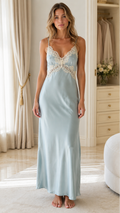 Model wearing light blue satin maxi slip dress from front