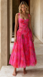 Front view of pink floral pleated midi dress