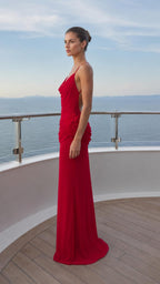 Side profile view of red evening gown