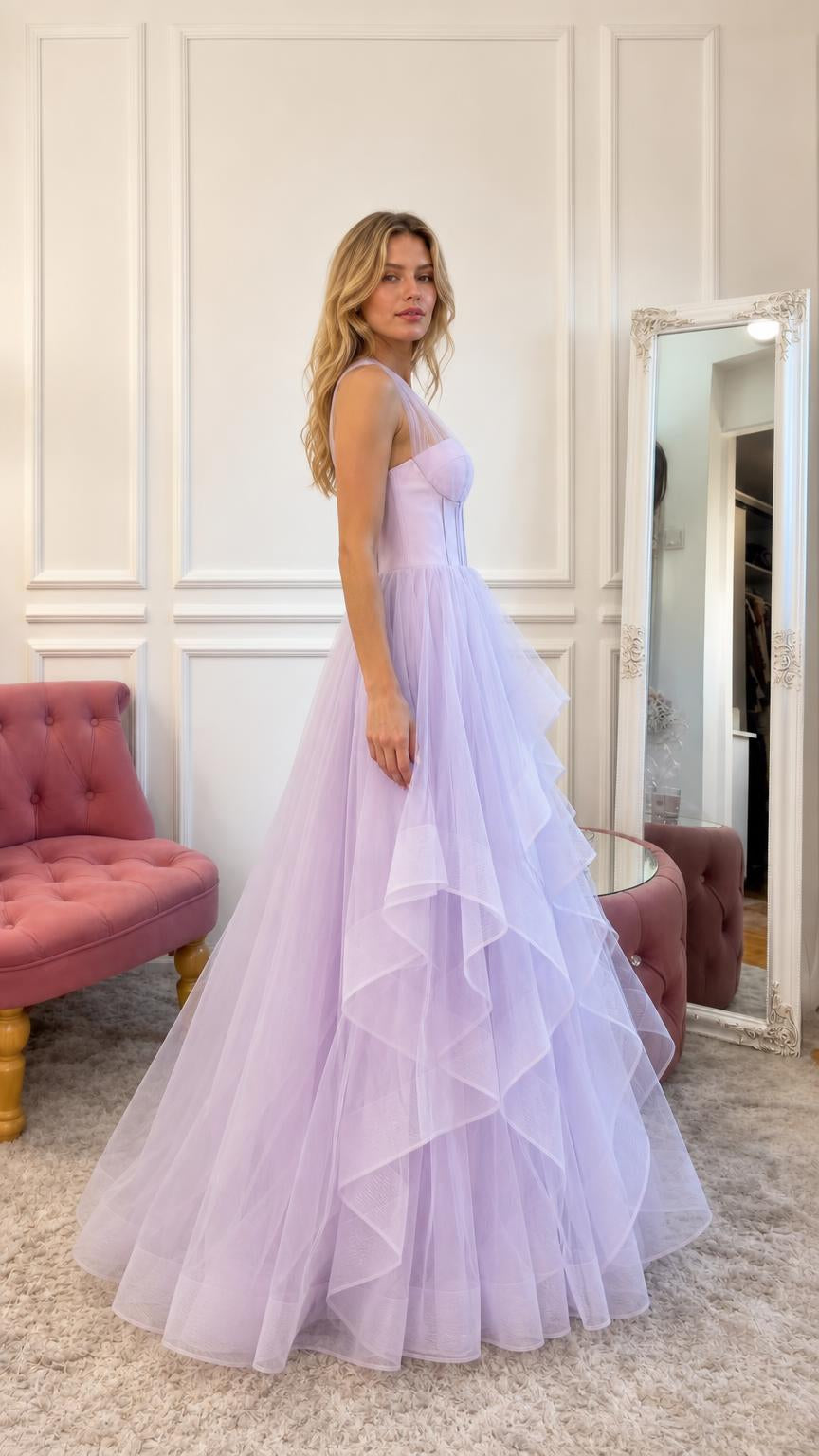 Side profile view of the lavender tiered gown