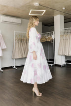 Side view of white floral midi dress