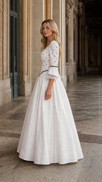 Side profile view of white Renaissance vintage maxi dress