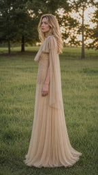 Side profile view of champagne tulle evening gown