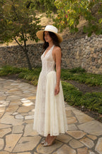 Side profile view of Cream Halter Lace Maxi Dress