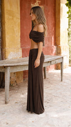 Side view of model wearing brown two-piece set