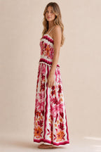 Side profile view of floral print maxi dress