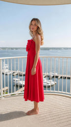 Side view of red midi dress with 3D bodice detail