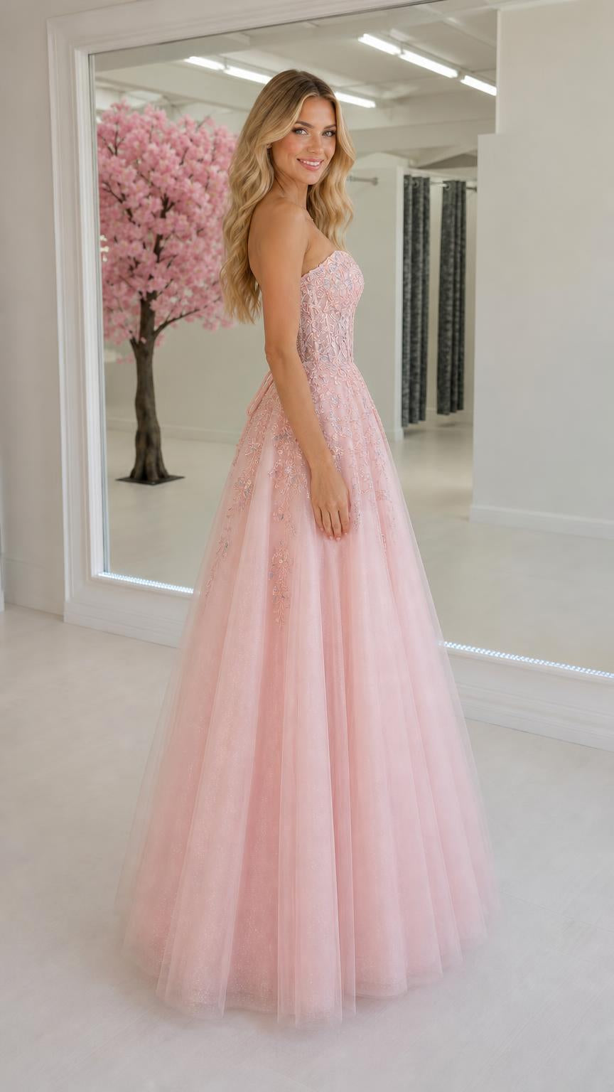 Side profile of pink ball gown showcasing silhouette