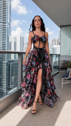 Full-length front view of black floral sleeveless maxi dress with layered ruffle skirt