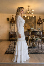 Side profile view of white lace mermaid gown