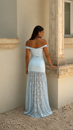 Back view of powder blue off-shoulder fitted maxi dress with flowing lace-look skirt