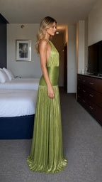 Side view of green halter pleated maxi dress