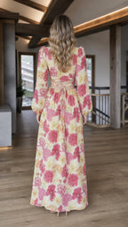 Back view of yellow floral print maxi dress showing back ties