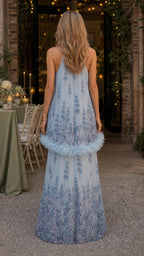 Back view of light blue floral halter maxi dress showing sweep hem
