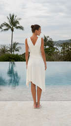 Back view of ivory sleeveless midi dress with V-back and draped asymmetric skirt