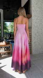 Back view of model wearing pink tie-dye maxi dress