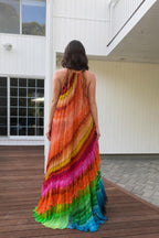 Back view showcasing halter neck ties on sunset rainbow maxi dress