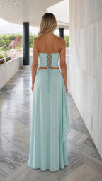 Back view showcasing lace-up corset detail on light blue top