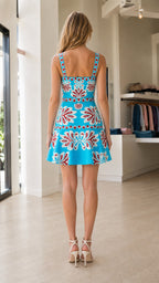 Back view of blue floral mini dress