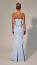 Back view of light blue strapless mermaid gown