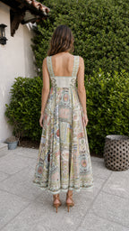 Back view of sage printed midi dress