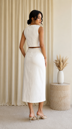 Back view of white sleeveless crop top and midi skirt matching set