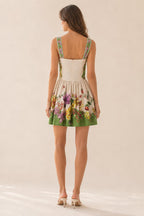 Back view of model showing back zipper and strap details