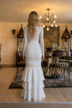 Back view of white lace tiered ruffle evening dress