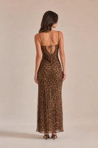 Back view showing adjustable tie straps on brown leopard print maxi dress