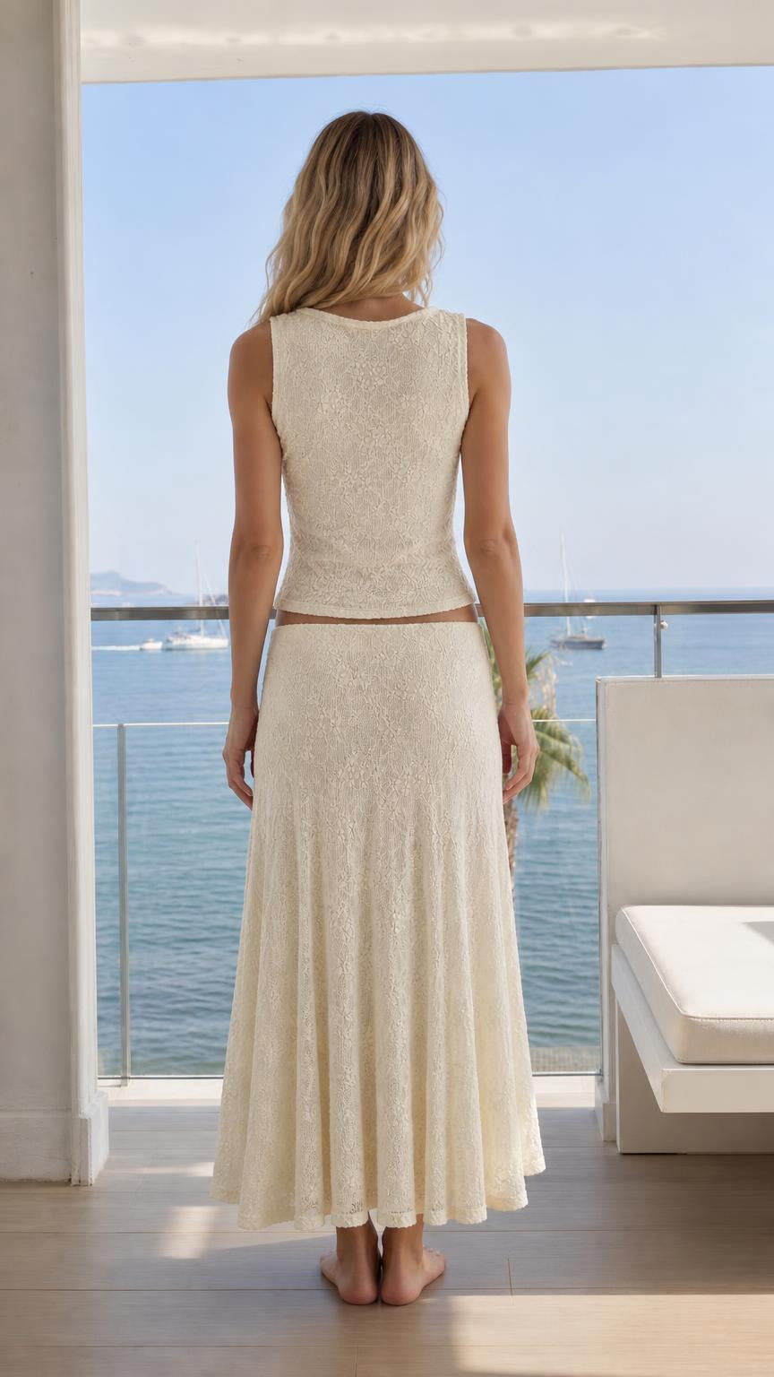 Back view of model wearing cream lace matching set