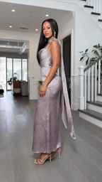 Side view of mauve sleeveless jacquard maxi dress with draped neckline