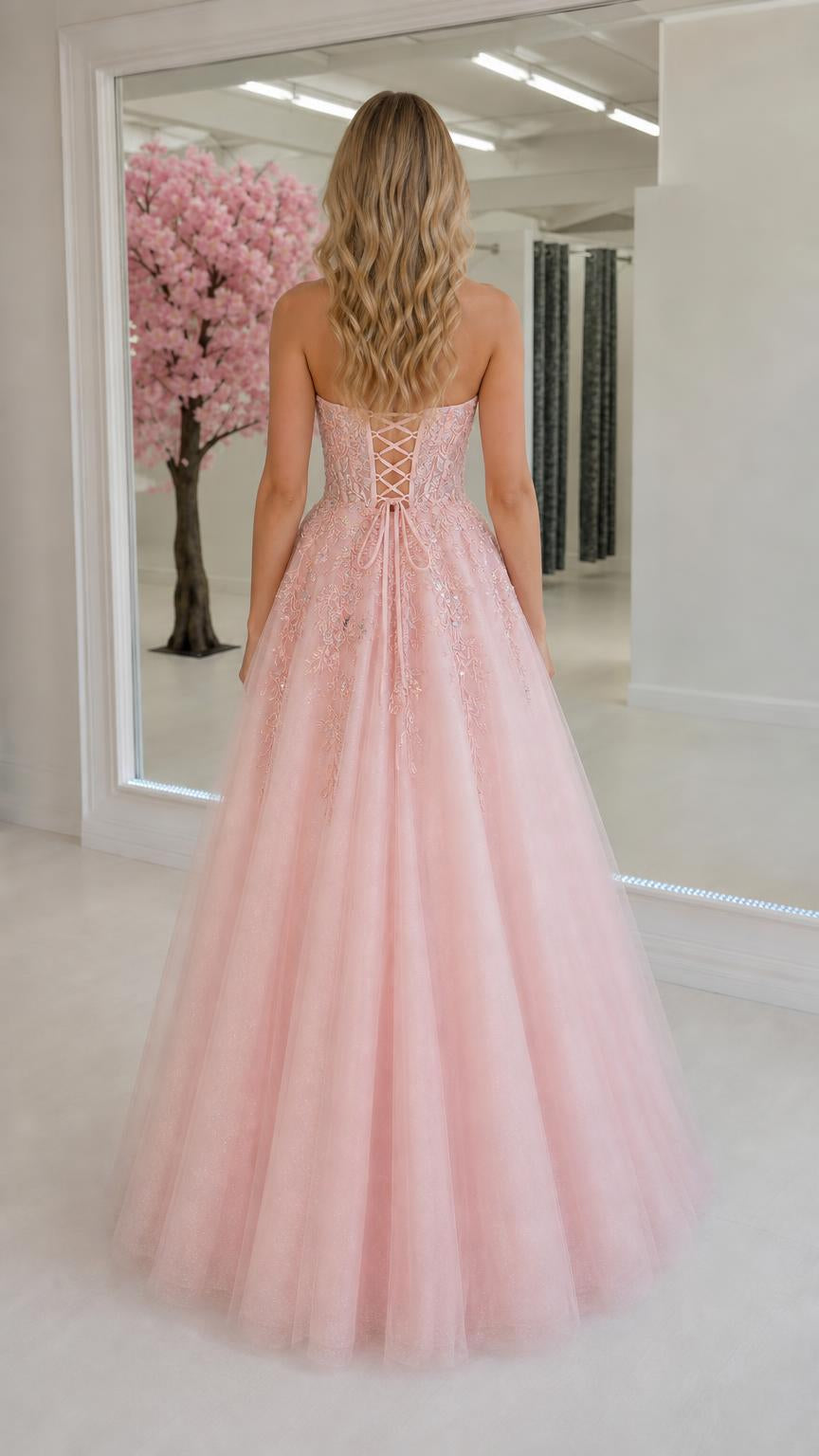 Back view of pink gown with lace-up corset detail