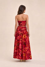 Model wearing red floral two piece set back view